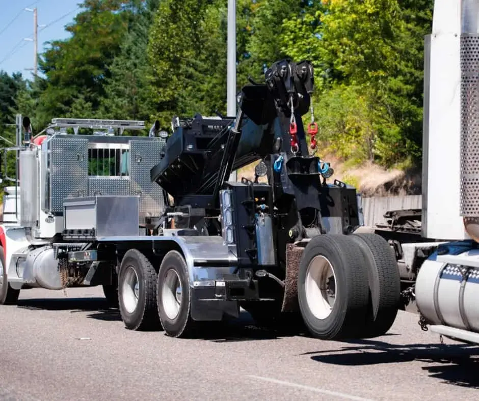 heavy-duty wrecker on a Angus highway shoulder